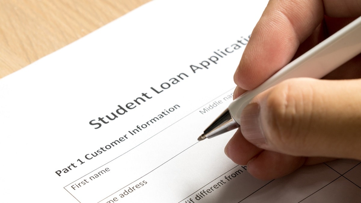 filling out student loan application paperwork