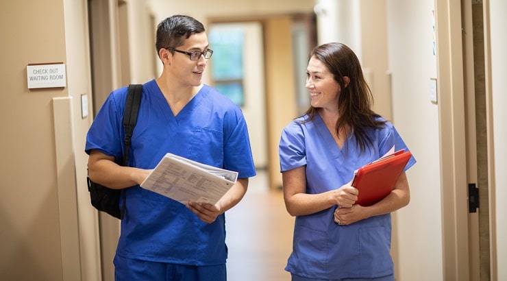 students in medical scrubs