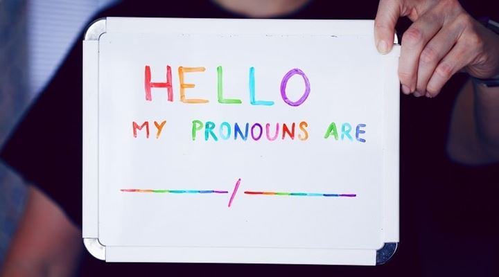 sign that says "my pronouns are"
