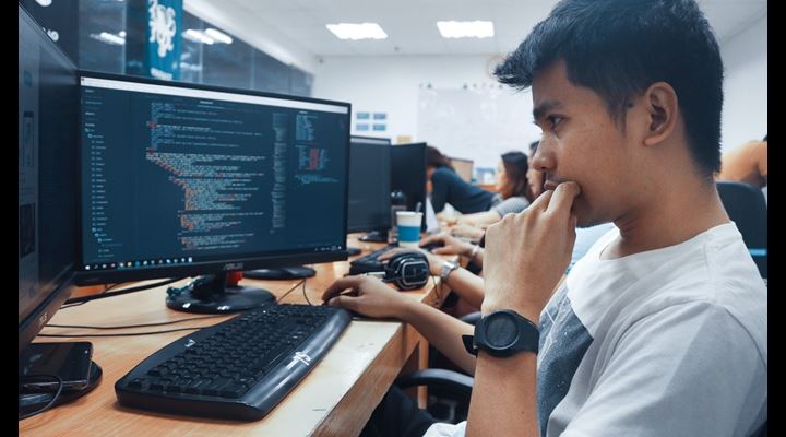 male student studying computer science
