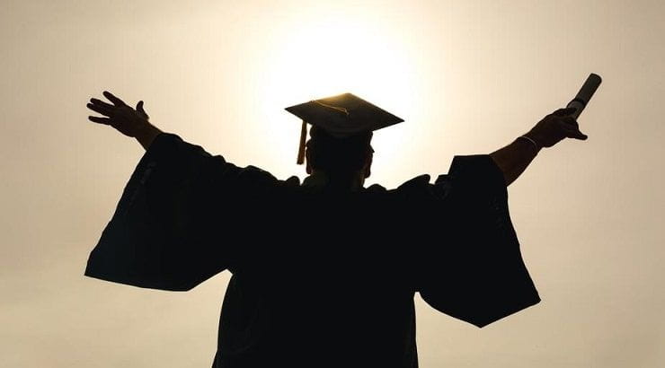 grad-student-with-arms-in-the-air