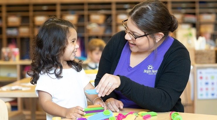 preschool teacher and student