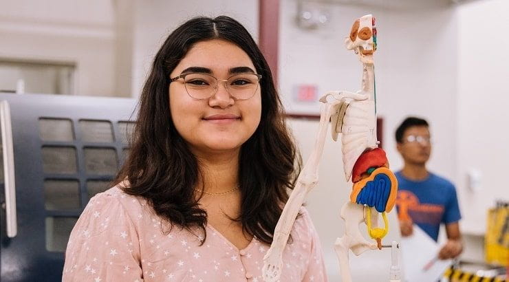 female student studying science