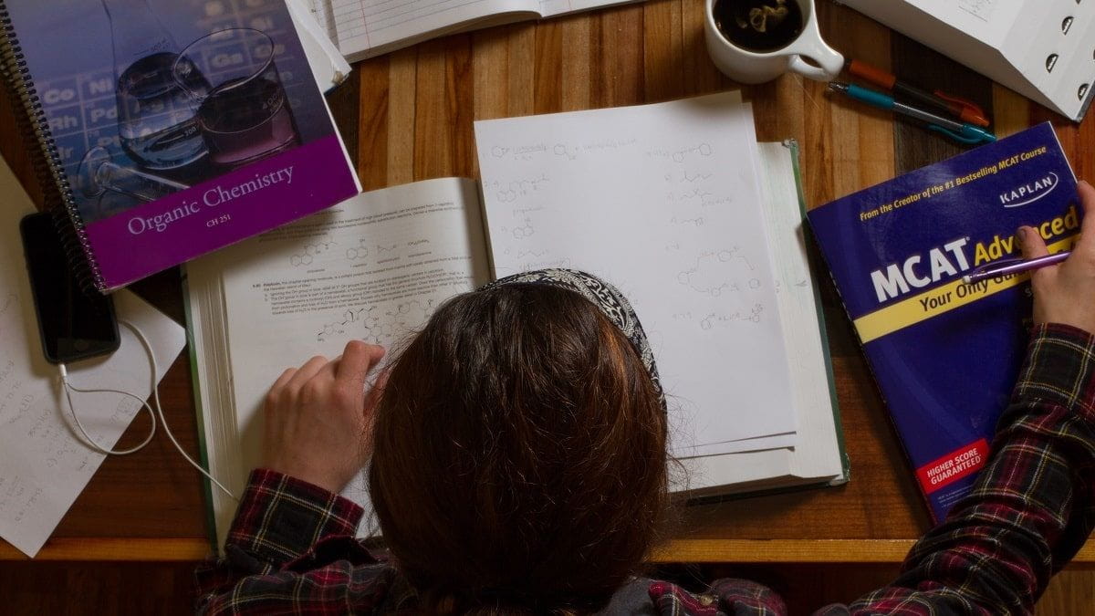 person studying for MCAT exam