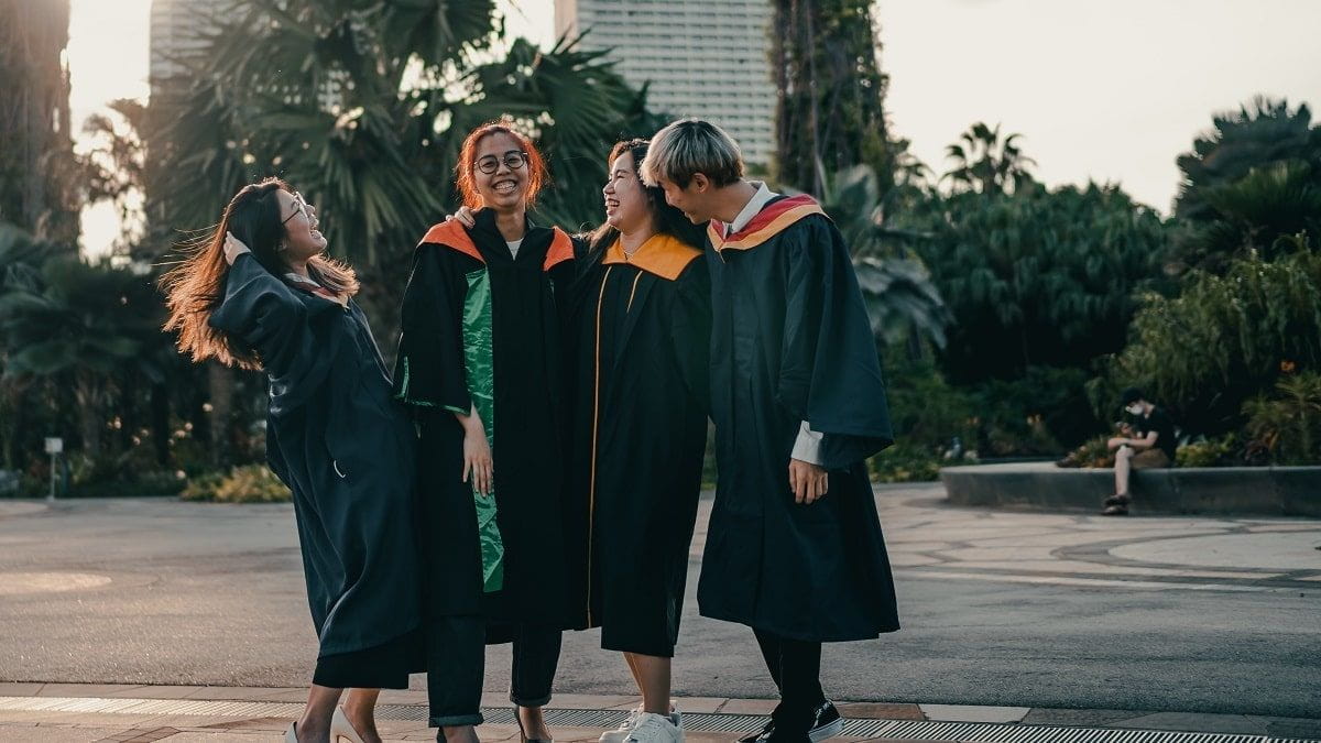 group of asian graduates