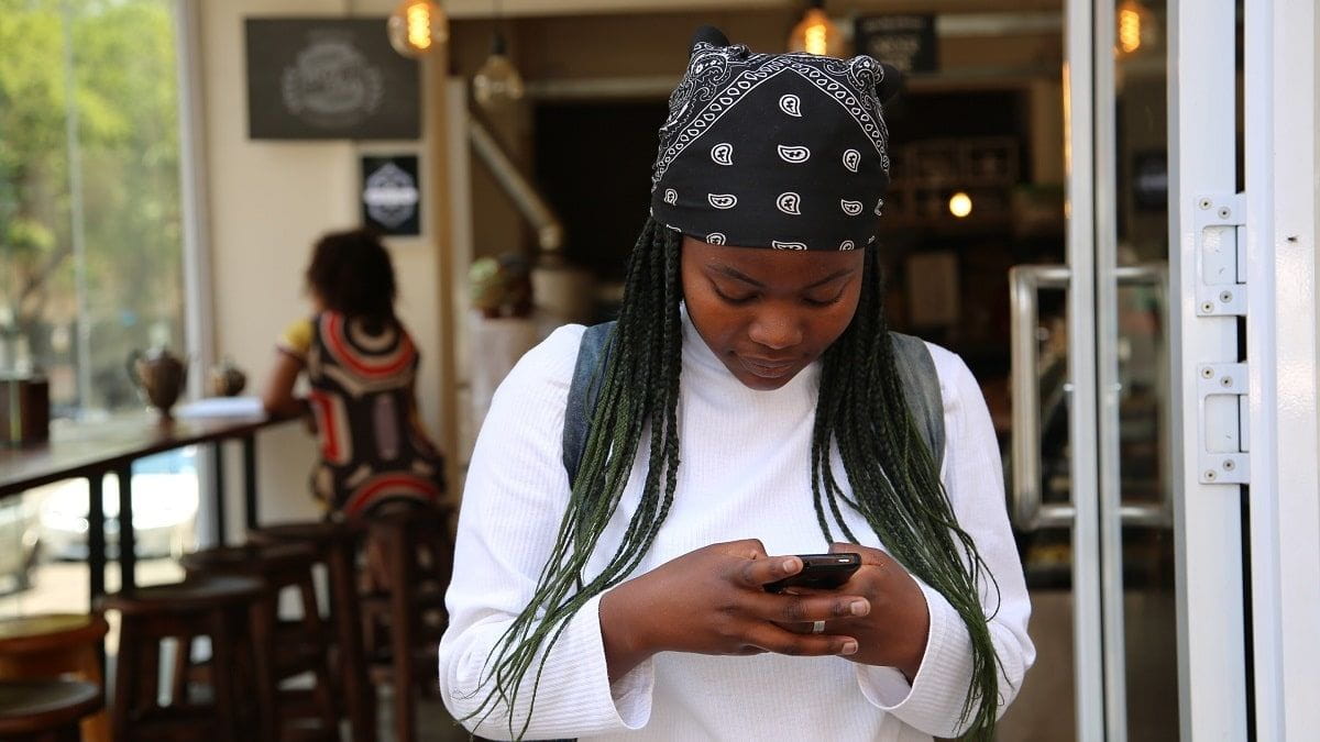 girl looking at phone