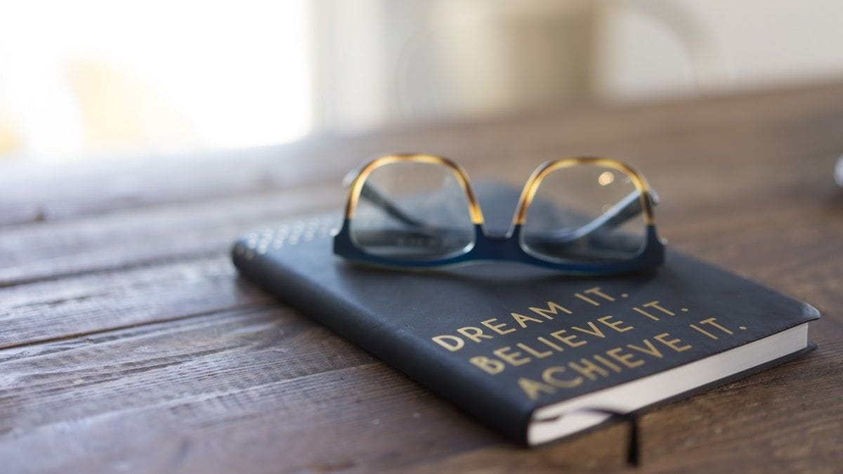 notebook that says dream it believe it achieve it