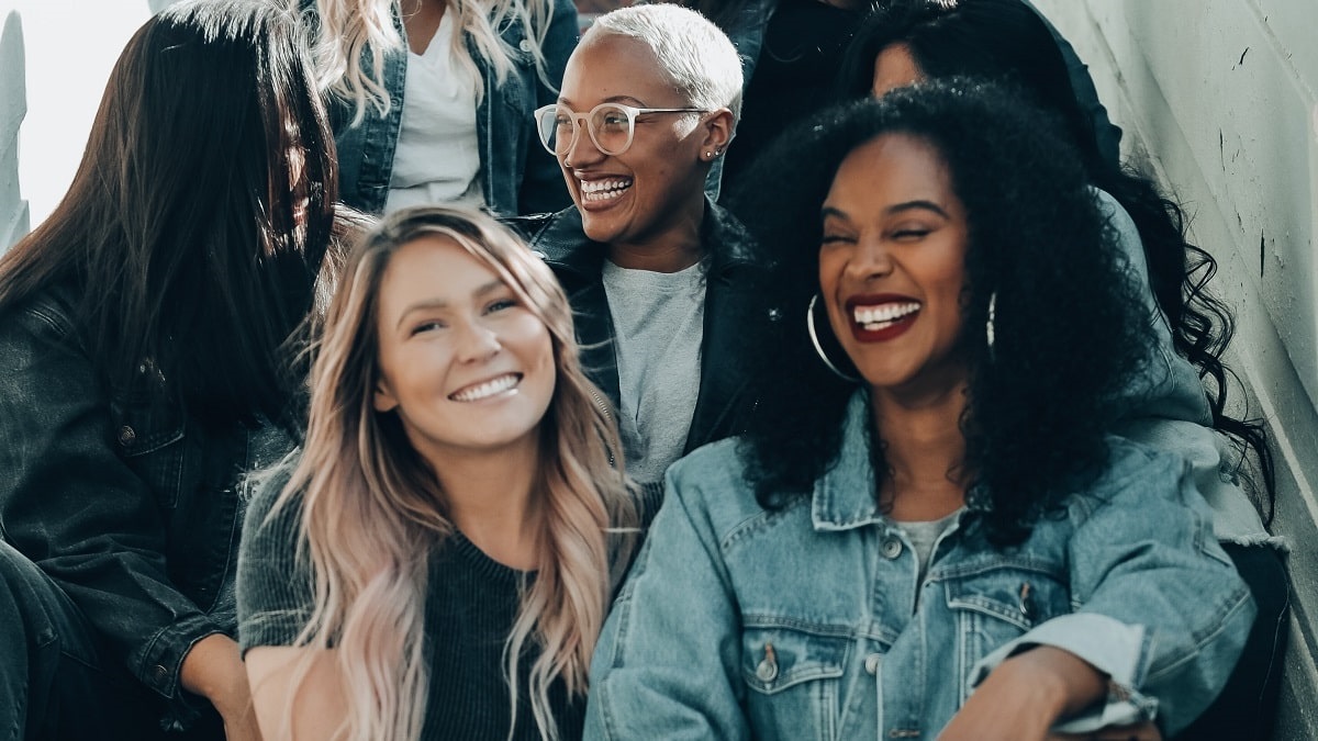 women talking and laughing