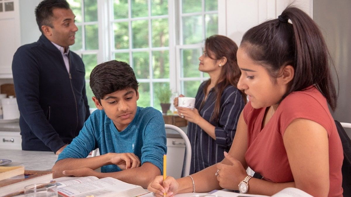 siblings working on homework