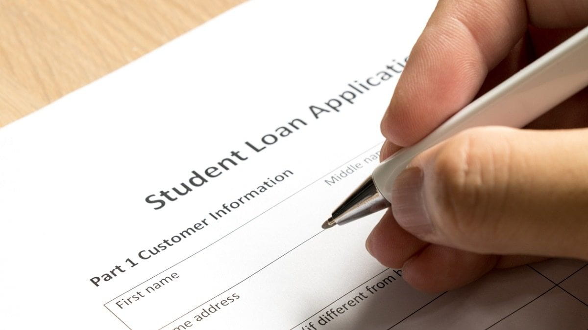 filling out student loan application paperwork