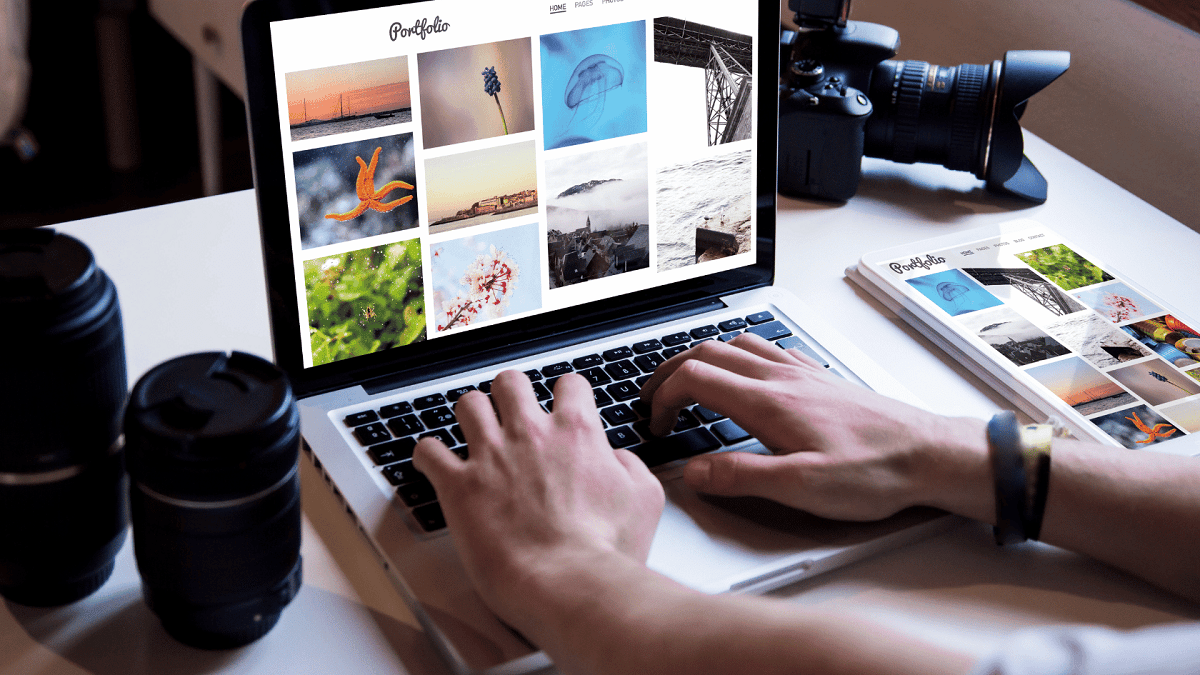 student making art portfolio on laptop