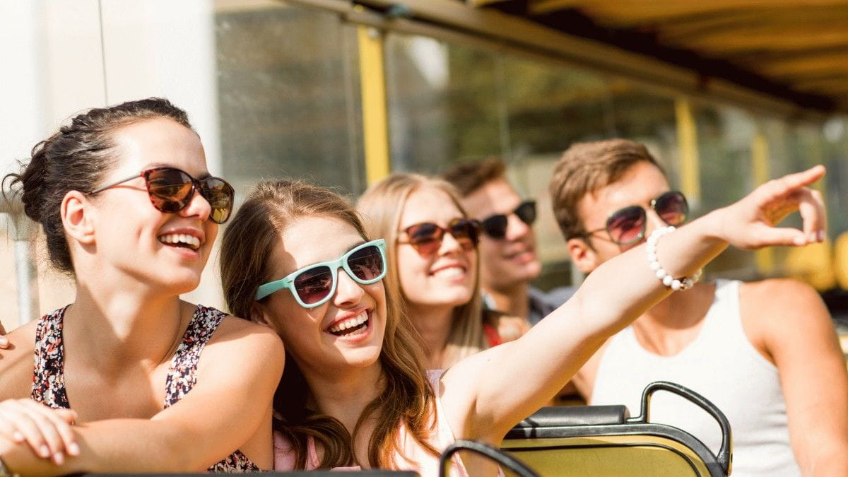 teenage friends traveling on bus
